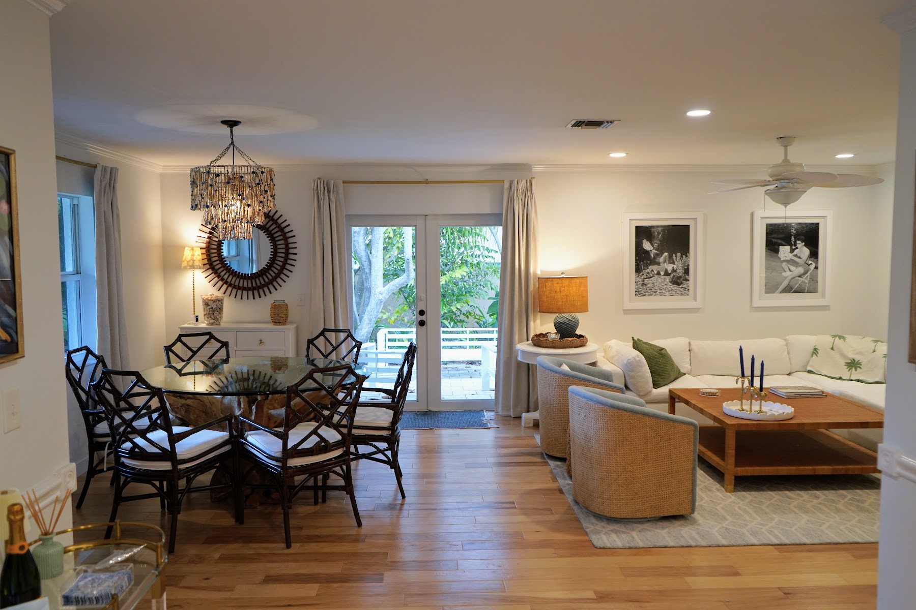 Open living and dining spaces with garden views