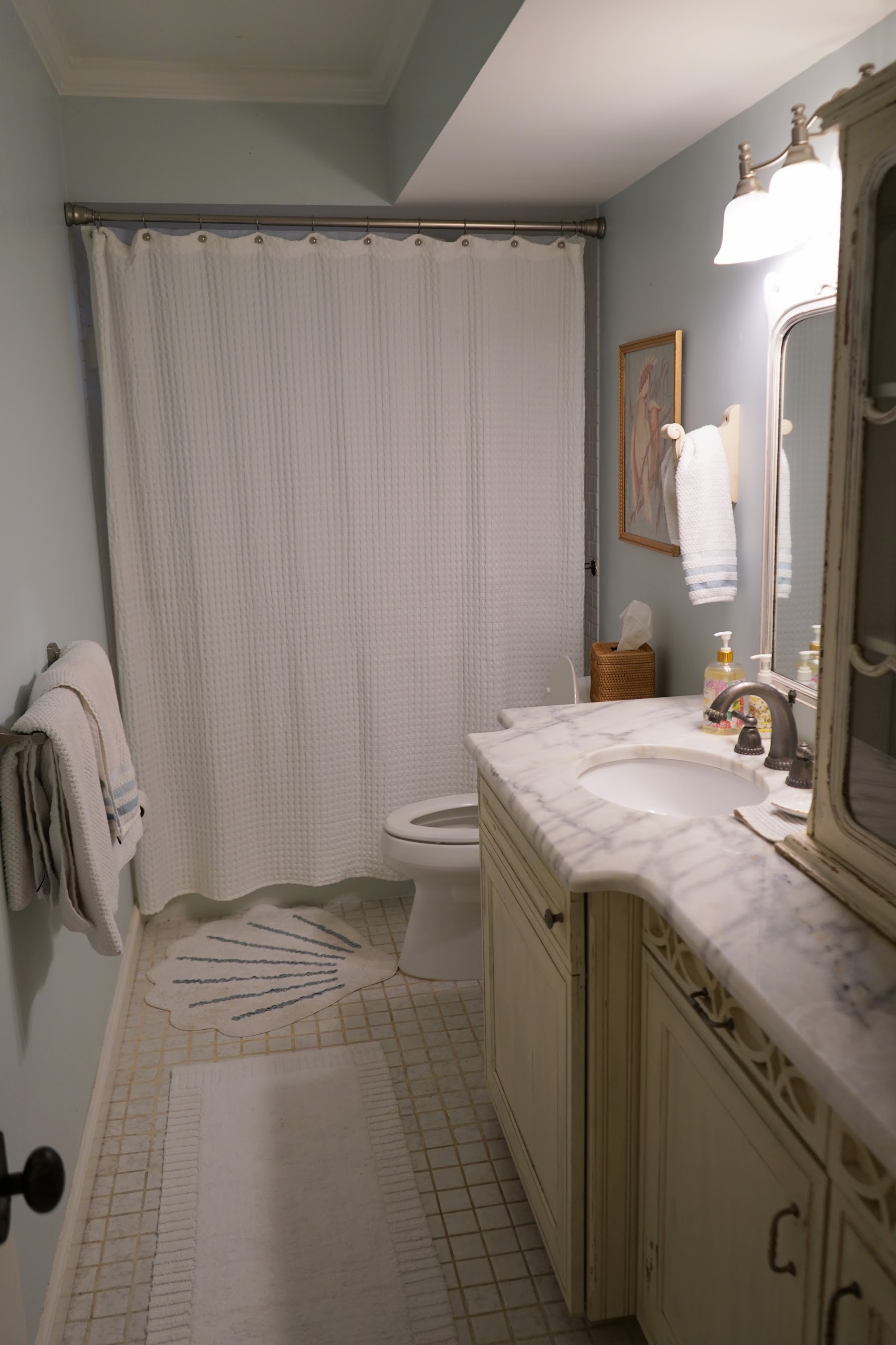 Full bathroom with tub and vanity